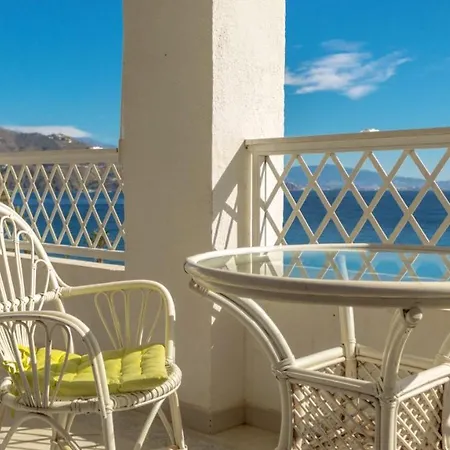 Seaside Serenity: Beachfront With Pool In